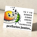 Chévere Greeting Card: Cute cartoon arroz con gandules characters, perfect for couples. Spanish text reads 'Tú y yo somos como arroz con gandules, perfectos juntos.'