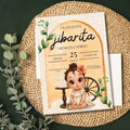 Chévereh Una Pequeña Jibarita baby shower invitation with neutral colors, greenery, and a cute baby illustration.