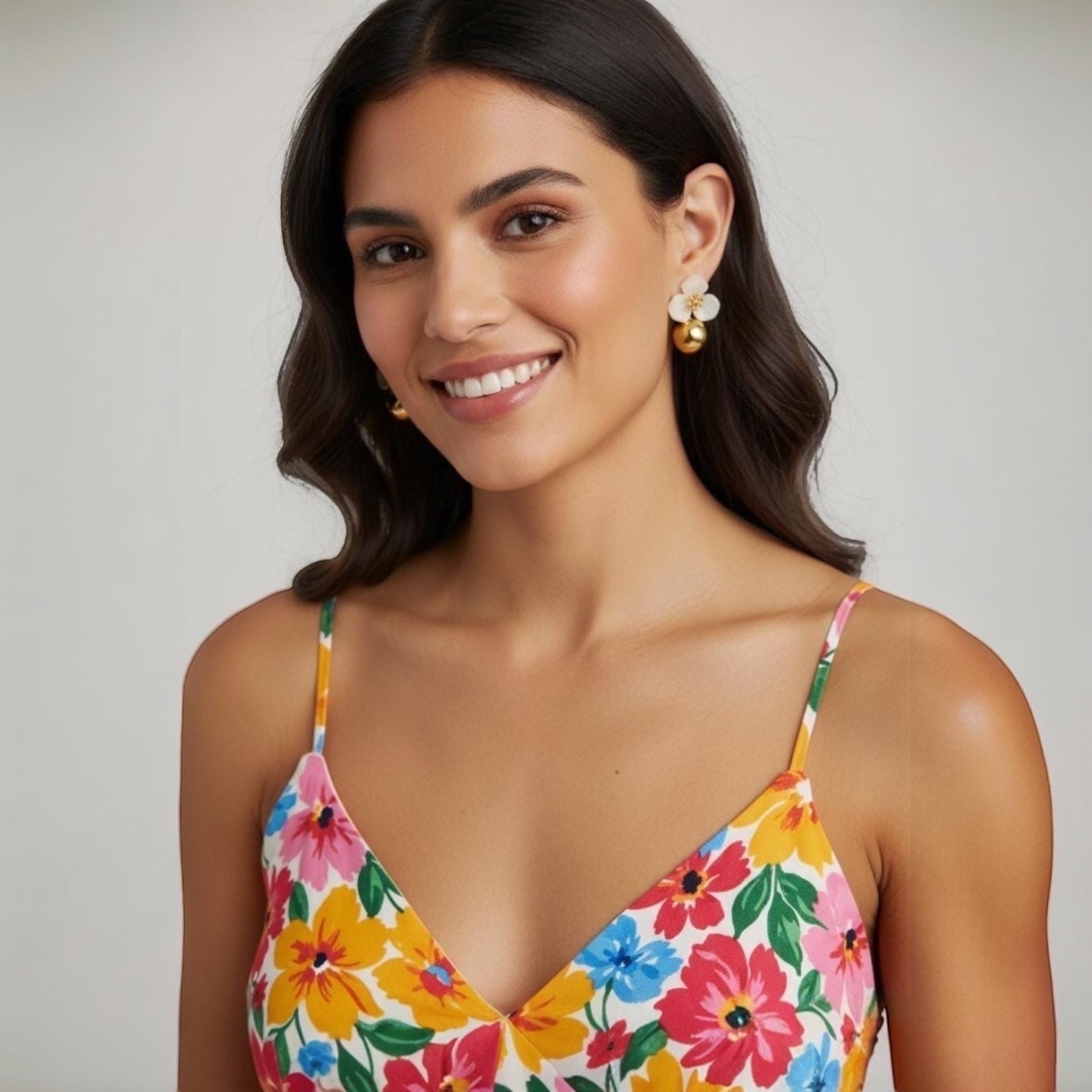 Chévereh beige hibiscus floral ball drop earrings with gold centers and polished gold ball charms.
