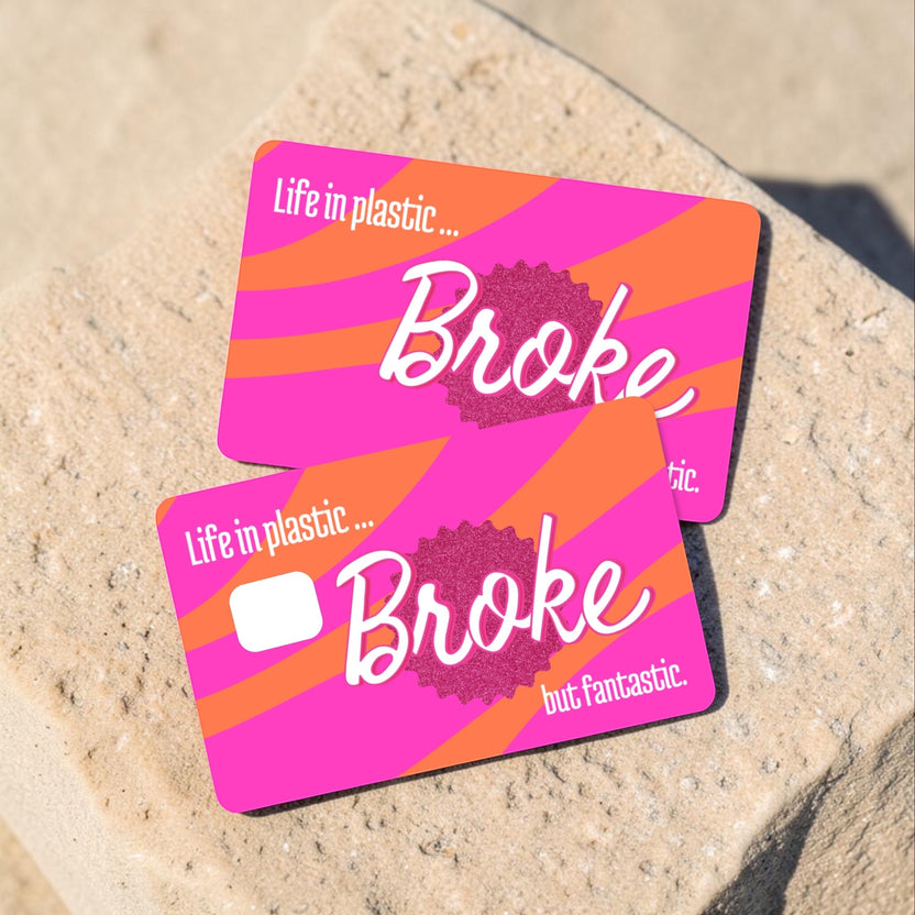 Chévereh waterproof debit and credit card skin with pink and orange stripes and "Life in plastic... Broke but fantastic" text.