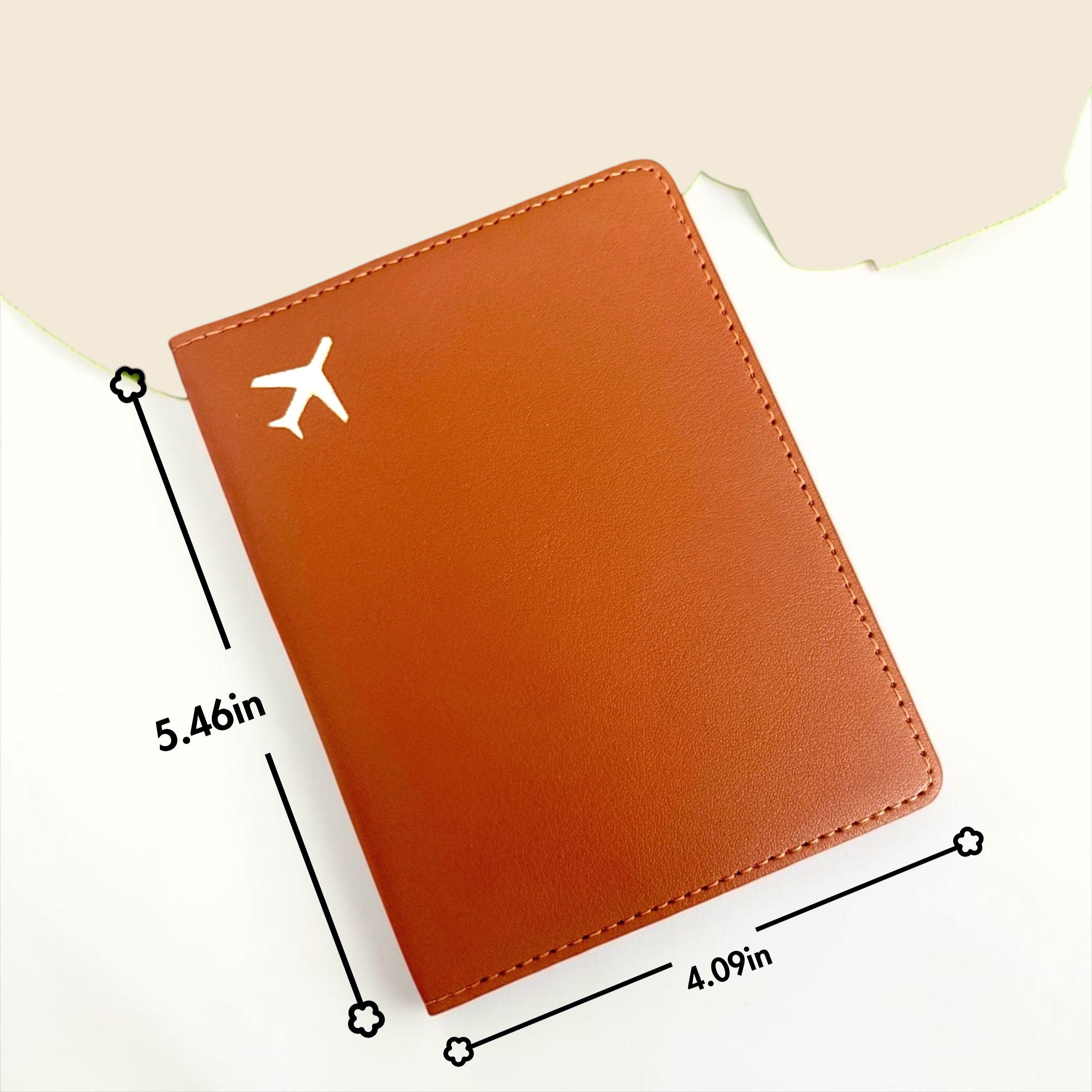 Chévereh brown PU leather passport holder with a minimalist gold airplane emblem for travel organization.