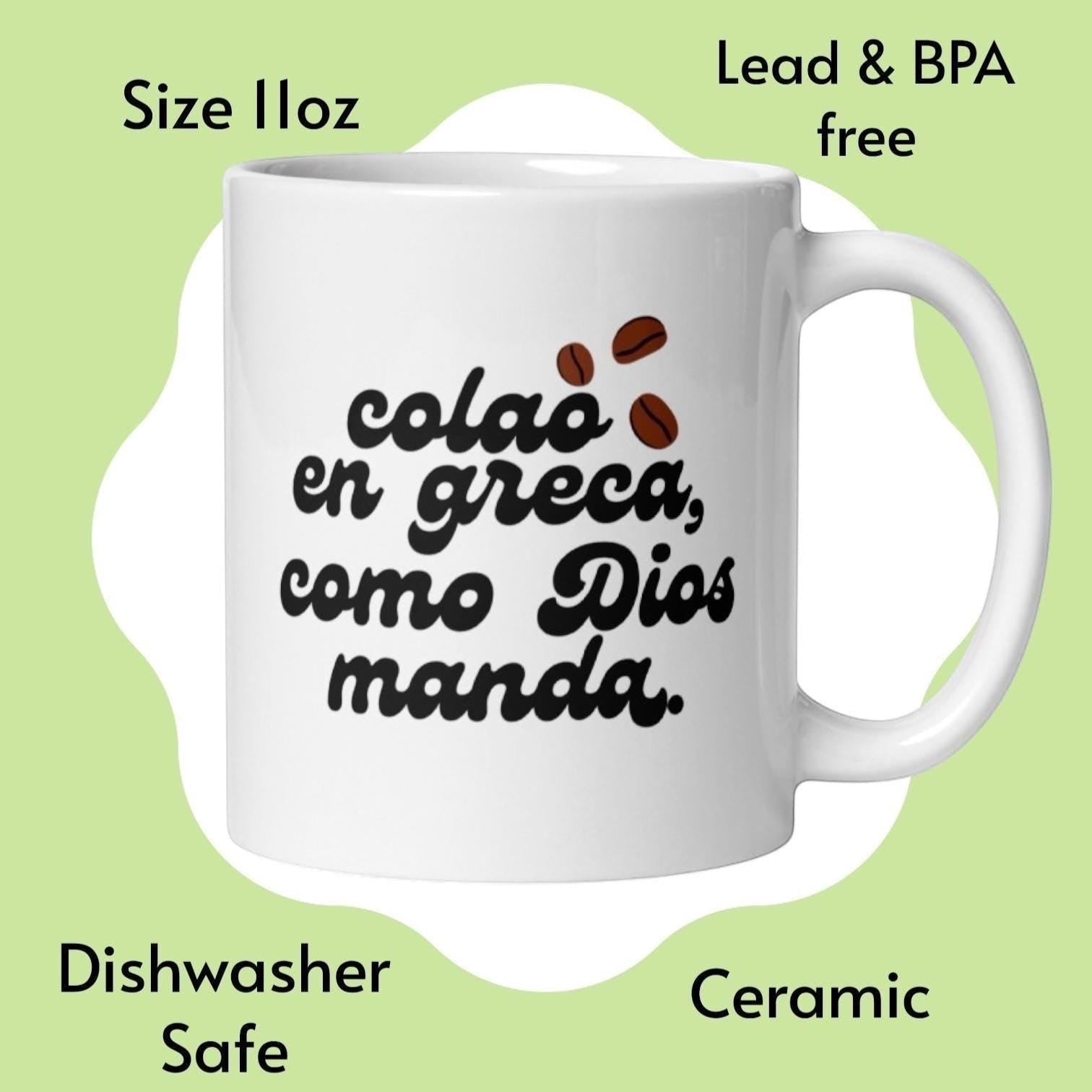 Chévereh Ceramic Mug 11oz with black text 'colao en greca, como Dios manda' and coffee beans.