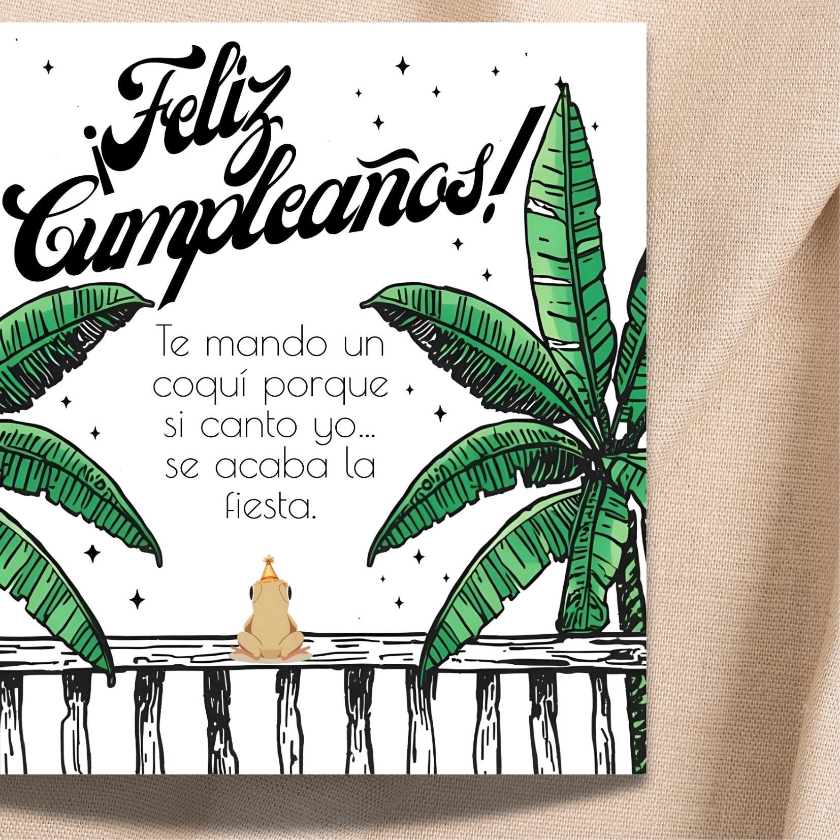 Chévereh Coquí Birthday Card with banana leaves and a frog wearing a party hat. Features Spanish text.