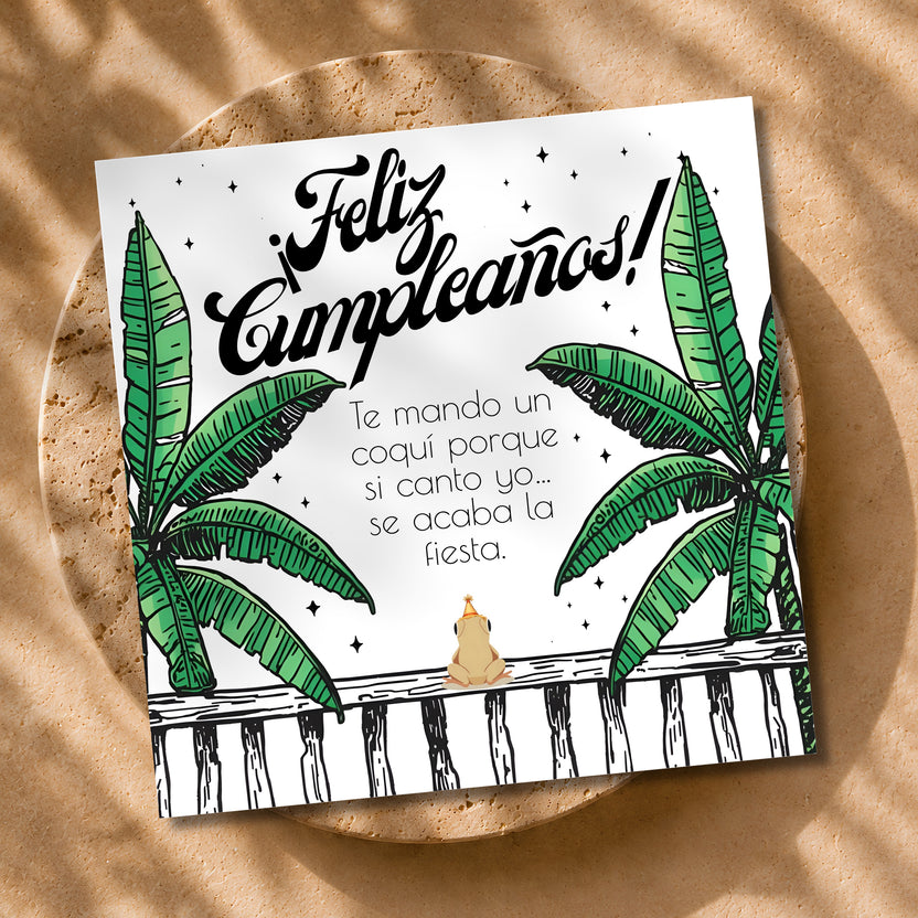 Chévereh Coquí Birthday Card digital download features a cute frog on a fence with banana leaves and Spanish text.