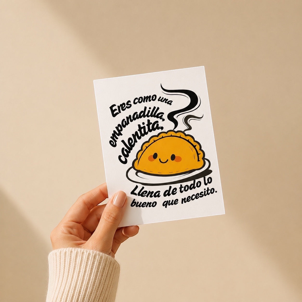 Chévereh Empanadilla Calientita digital art postcard with a smiling empanadilla and Spanish text.