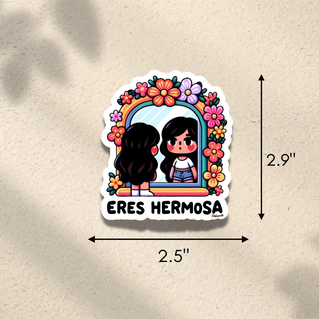 Chévereh Eres Hermosa vinyl sticker featuring a girl looking in a mirror surrounded by colorful flowers. Waterproof glossy finish.