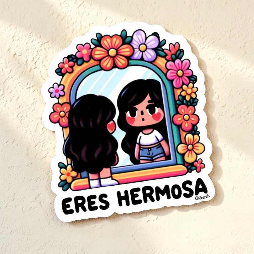Chévereh Eres Hermosa vinyl sticker featuring a girl looking in a mirror surrounded by colorful flowers. Waterproof glossy finish.