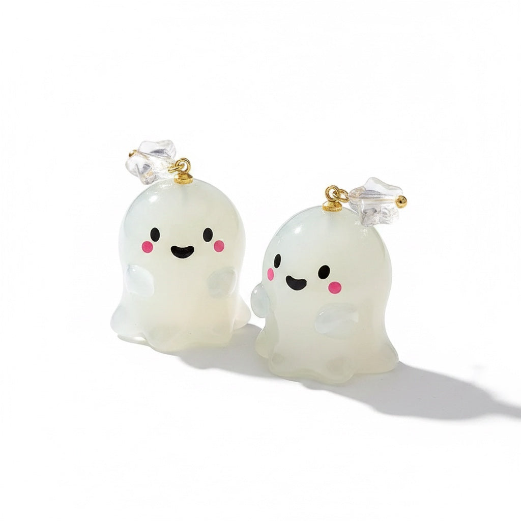 Chévereh Ghost and Pumpkin Earrings with clear crystal accents, featuring cute white ghost charms with pink cheeks and black eyes.