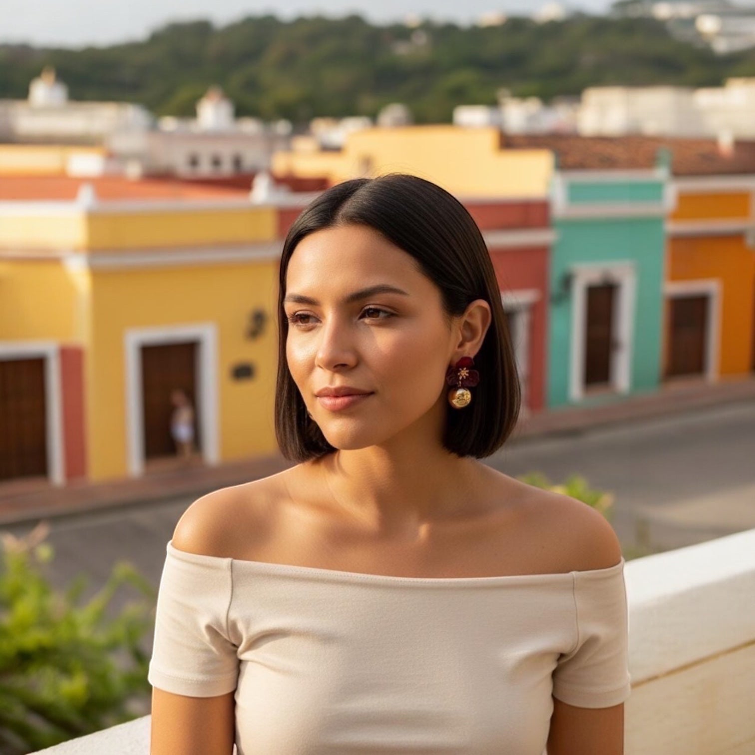 Chévereh Hibiscus Floral Ball Drop Earrings in gold and red, featuring a hibiscus flower with a gold center and a polished gold ball charm.