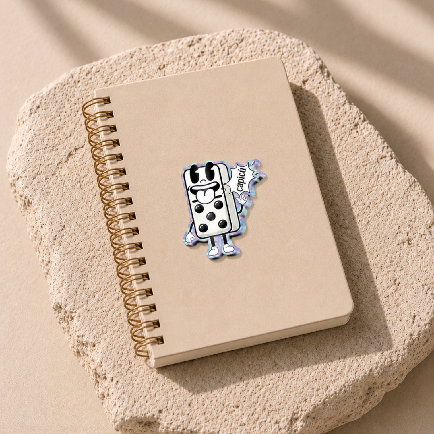 Chévereh holographic vinyl sticker of a cartoon domino character with "Capicú!" speech bubble, glossy finish.