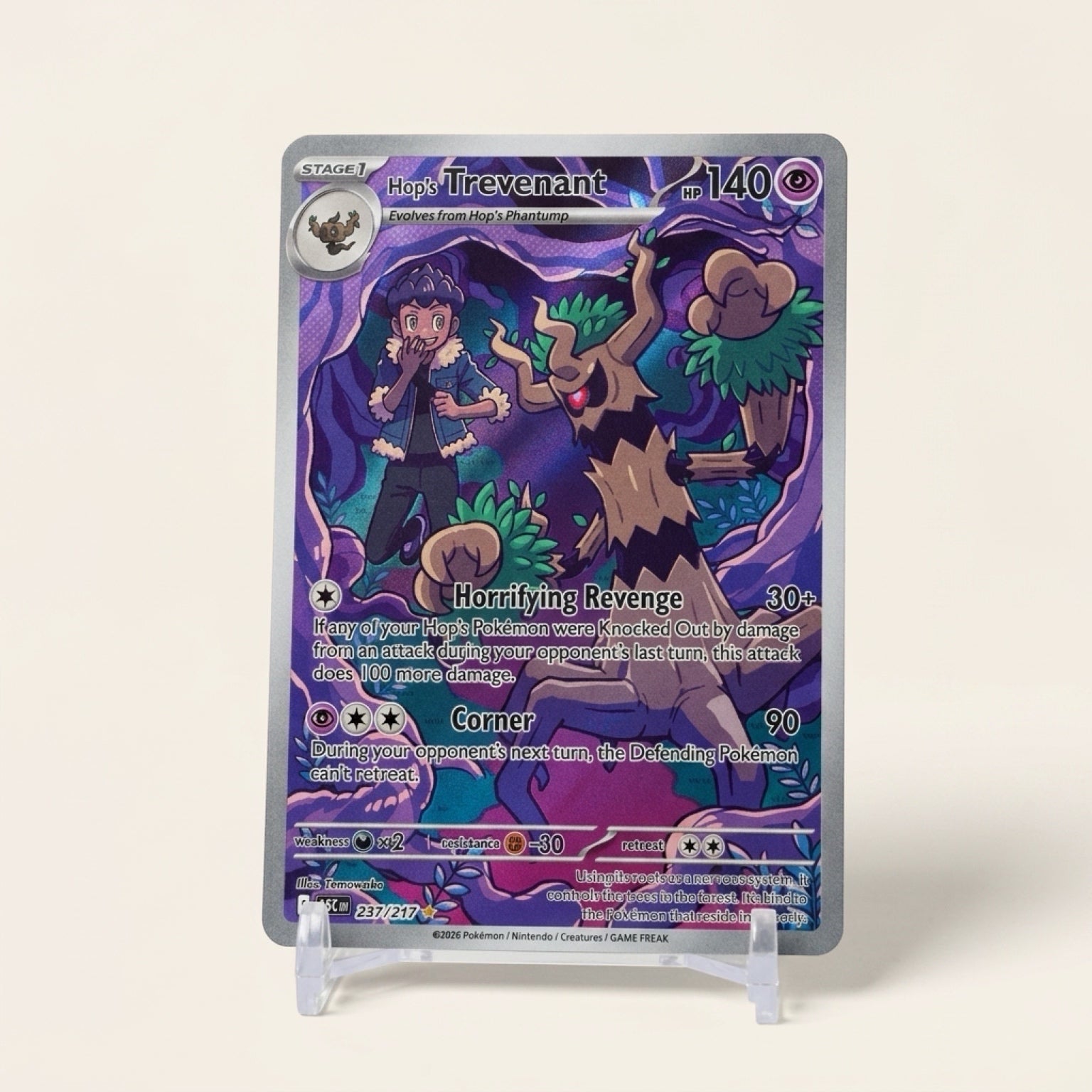 Chévereh Hop’s Trevenant 237/217 Illustration Rare Pokémon card featuring Hop and Trevenant in a purple forest scene.