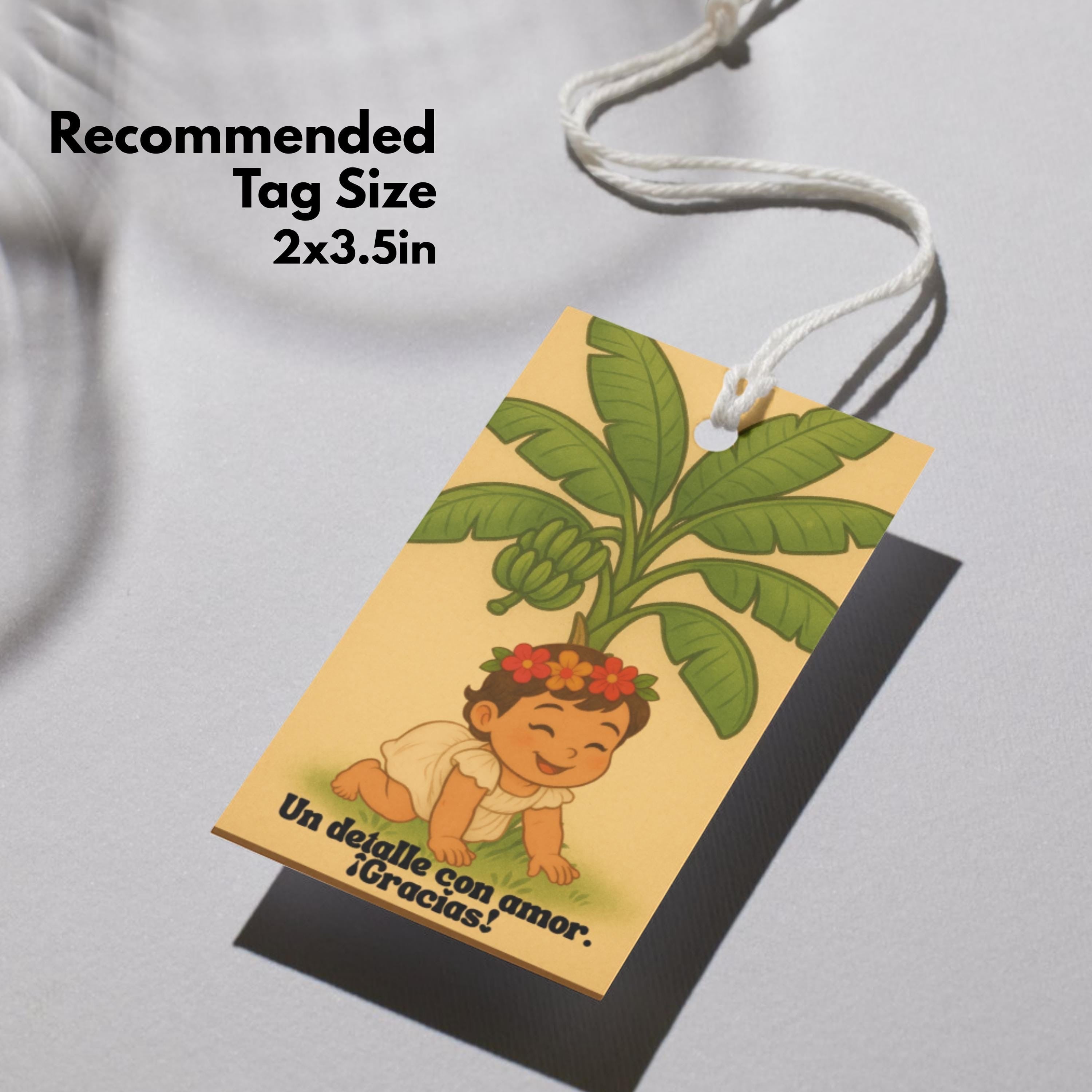 Chévereh 'Nuestra Jibarita' baby shower gift tag featuring a crawling baby with a flower crown under a banana tree. Text reads 'Un detalle con amor. ¡Gracias!'