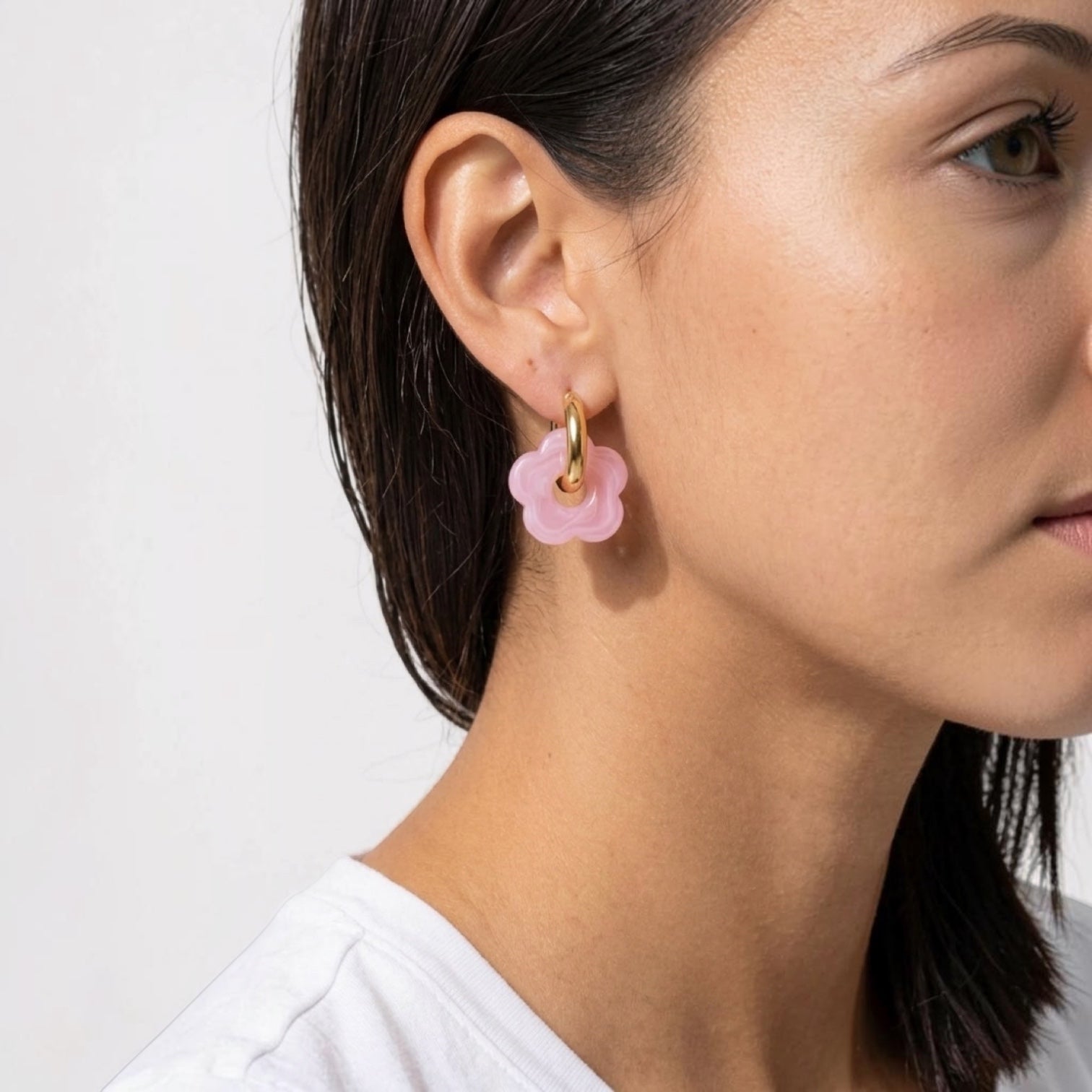 Chévereh Pink Bloom & Gold drop style earrings with translucent flower charms on gold hoops.