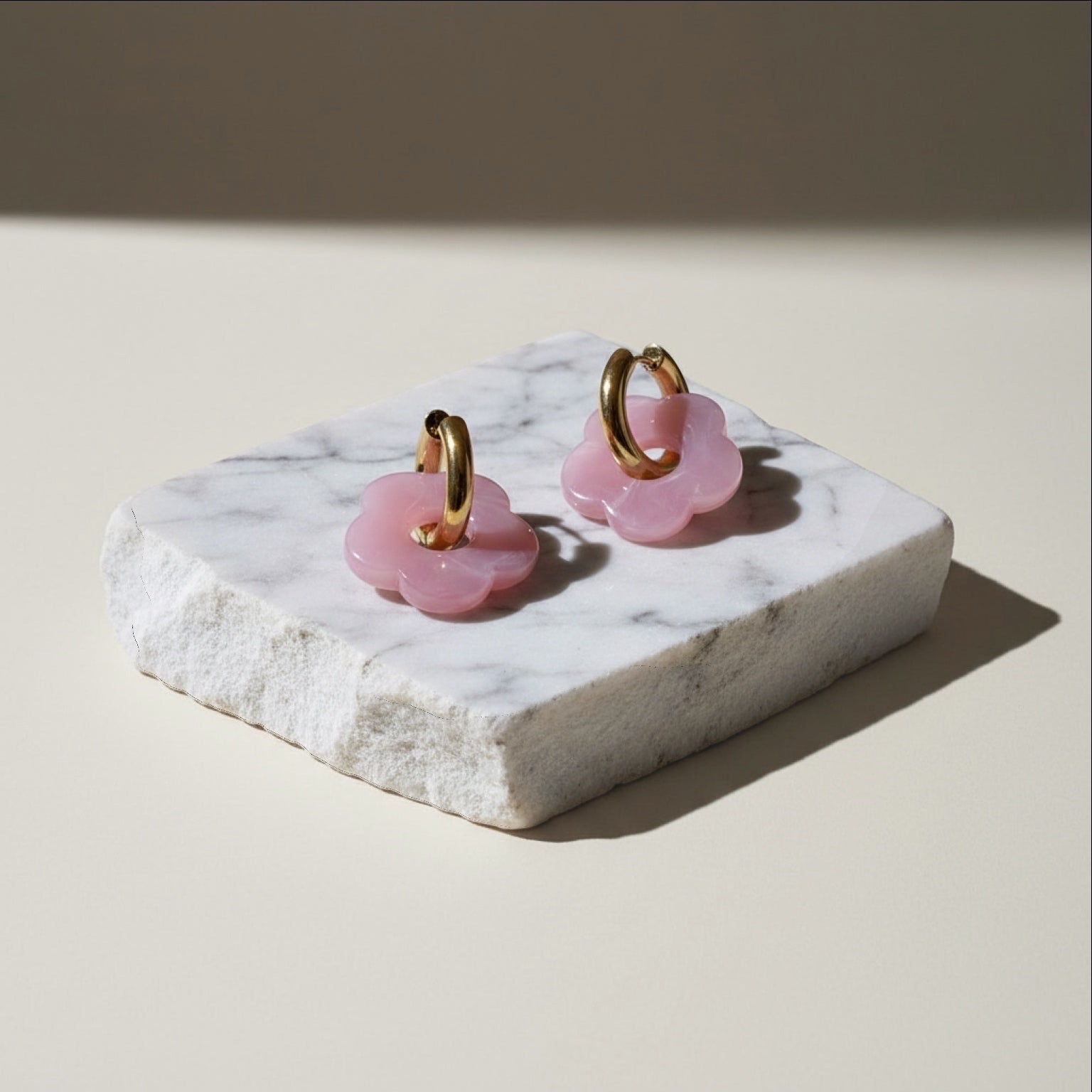 Chévereh Pink Bloom & Gold flower drop earrings with gold hoops and translucent pink petals.