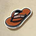 Chévereh Puerto Rico flip-flop vinyl sticker with brown textured sole and black straps. Waterproof glossy finish.