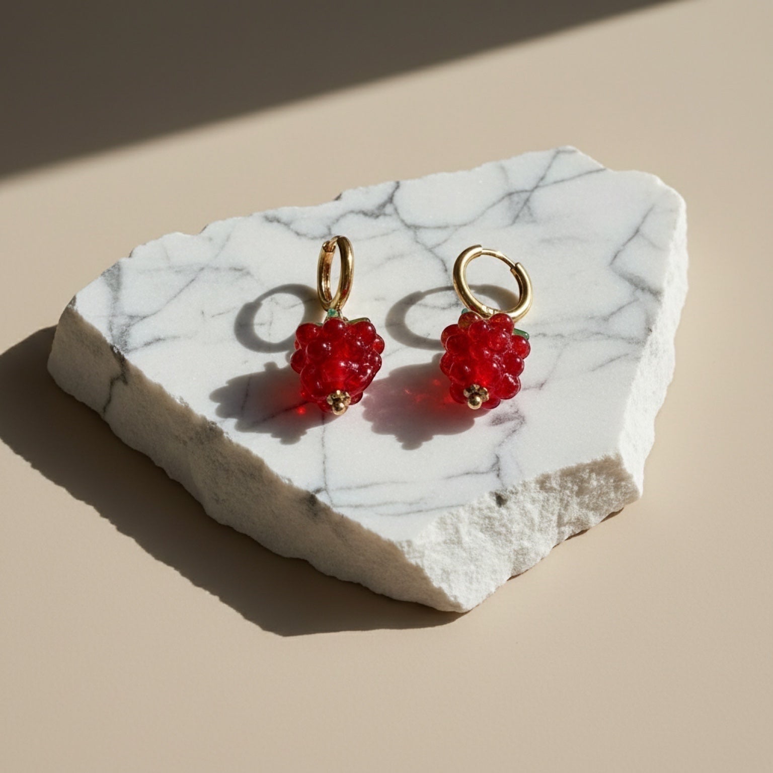 Chévereh Raspberry Glass Drop Earrings with red glass beads, gold accents, and gold hoops.