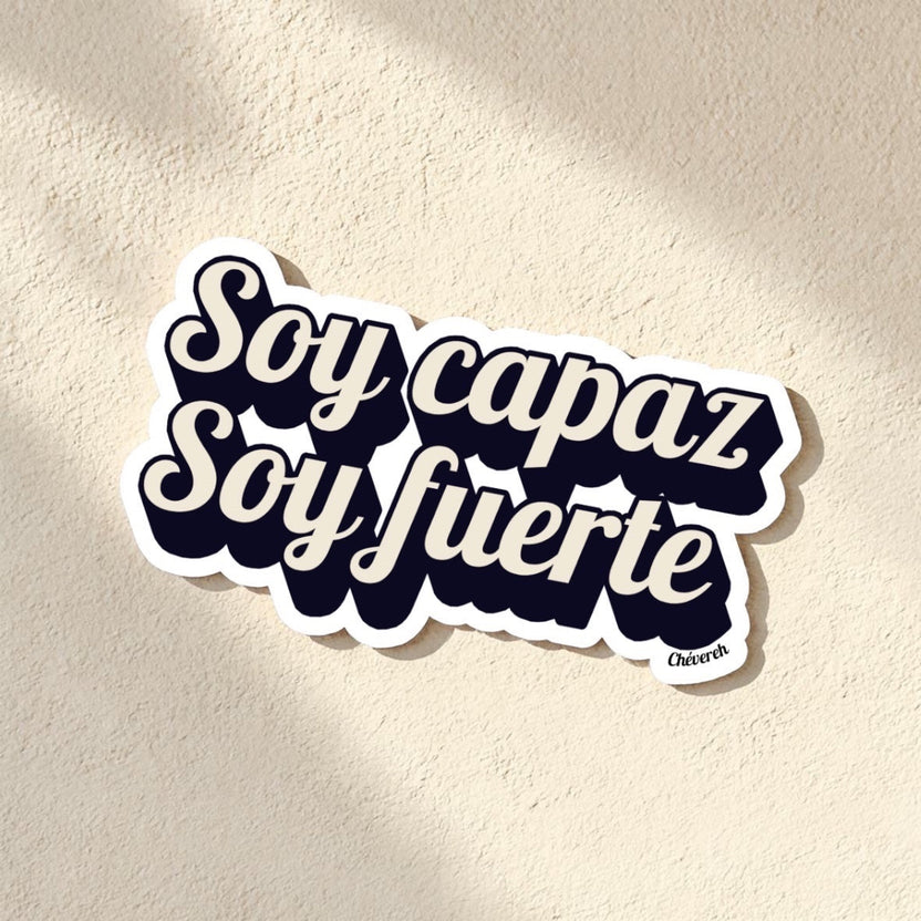 Chévereh Soy capaz Soy fuerte vinyl sticker with bold cream lettering on a black background. Waterproof and glossy finish.