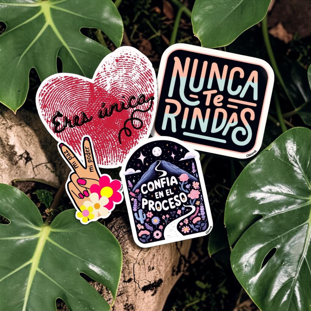 Chévereh glossy vinyl sticker pack with Latina-inspired Spanish affirmations on a background of green monstera leaves.