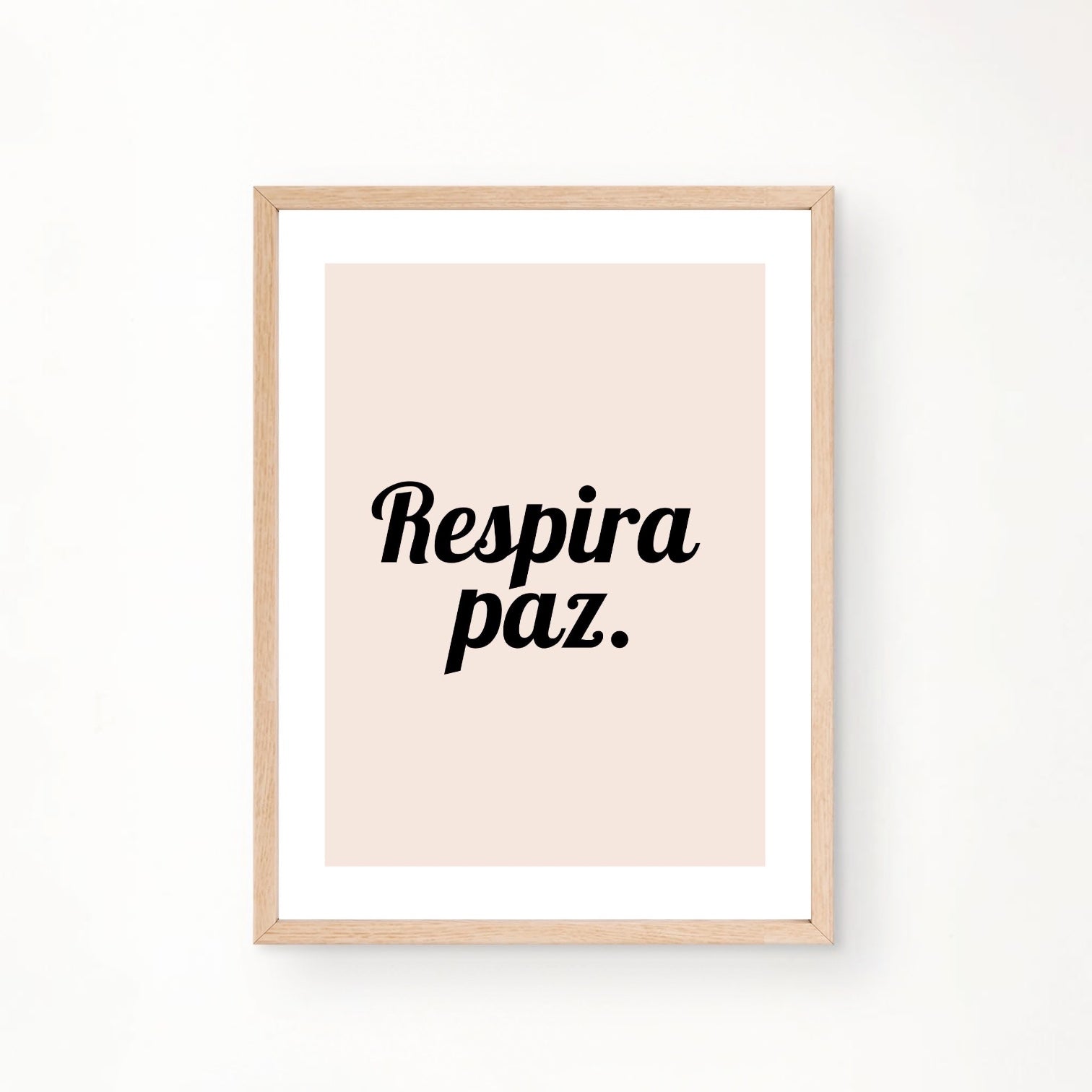 Chévereh Inspirational Spanish Quote 'Respira Paz' (Breathe Peace) digital art print with black script font on a pale pink background.
