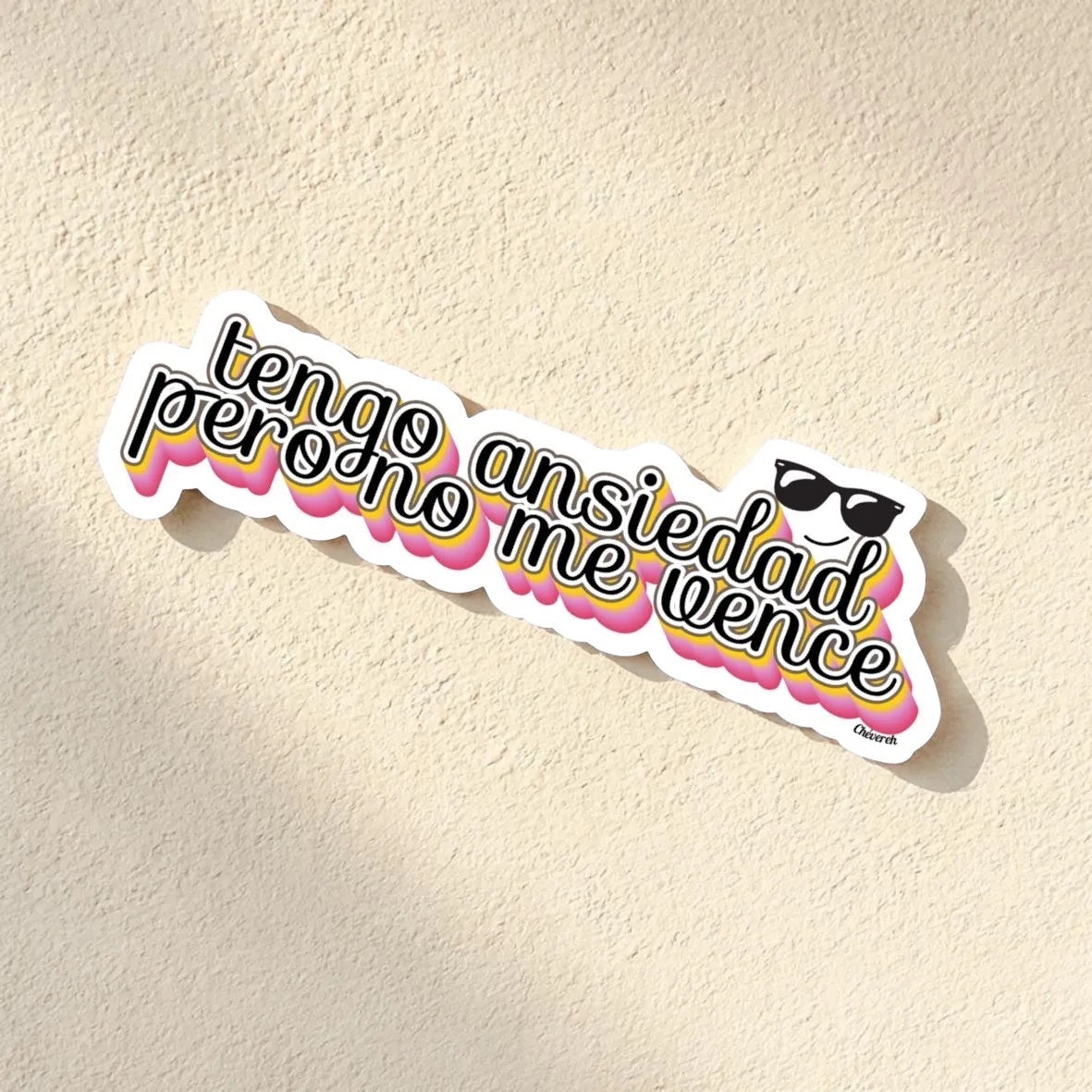 Chévereh Tengo Ansiedad vinyl sticker with pink and yellow gradient text and sunglasses, waterproof glossy finish.