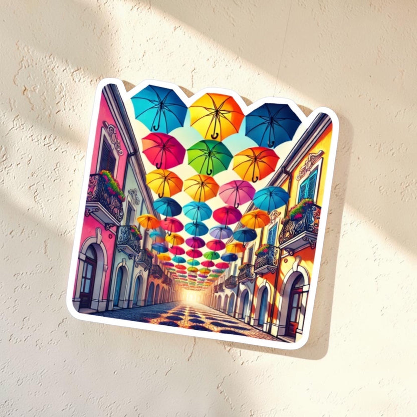 Chévereh Umbrella Old San Juan Alley sticker with glossy finish, featuring colorful umbrellas over a street.