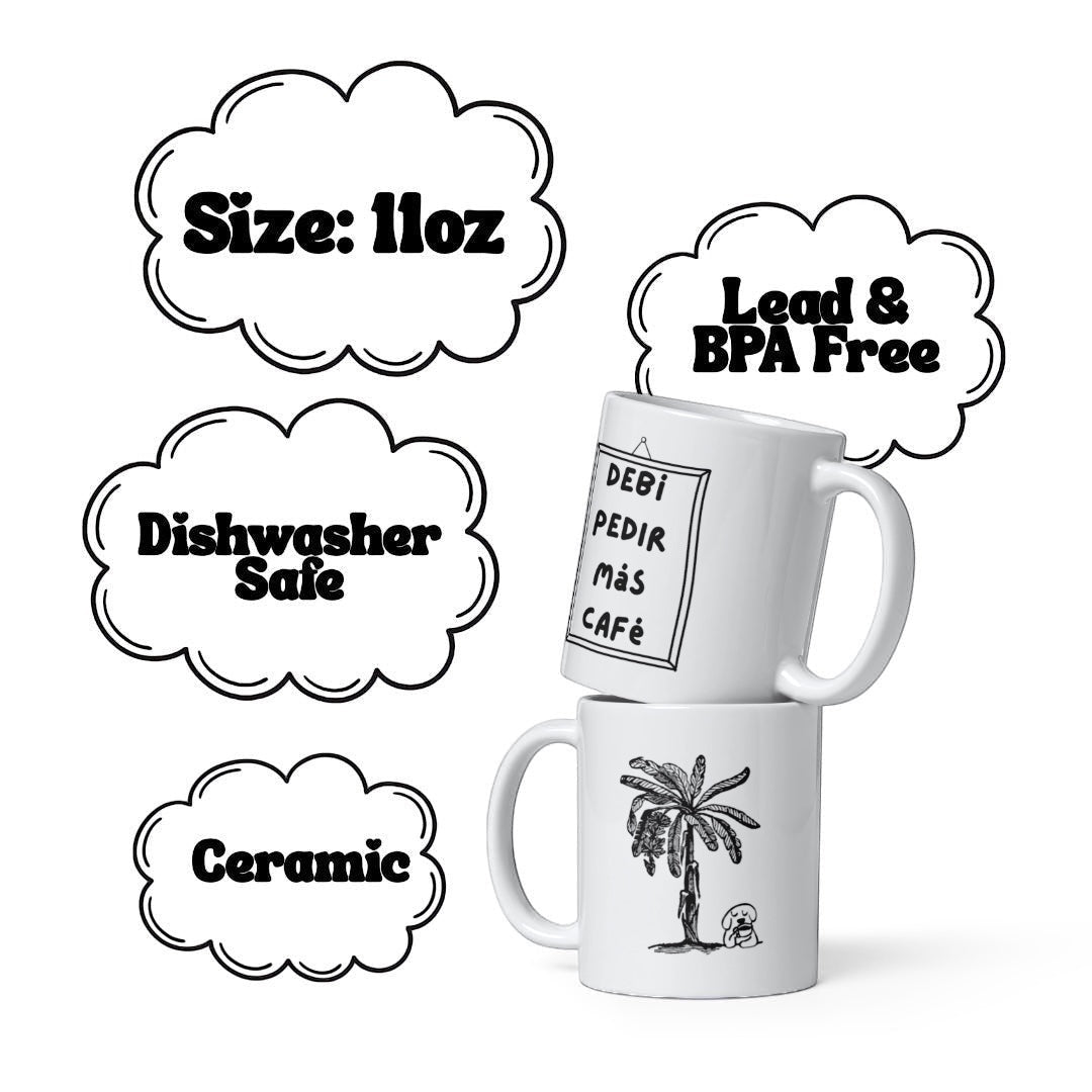 Chévereh white ceramic mug with Spanish text "Debí Pedir Más Café" and a palm tree illustration. 11oz, dishwasher safe, lead & BPA free.