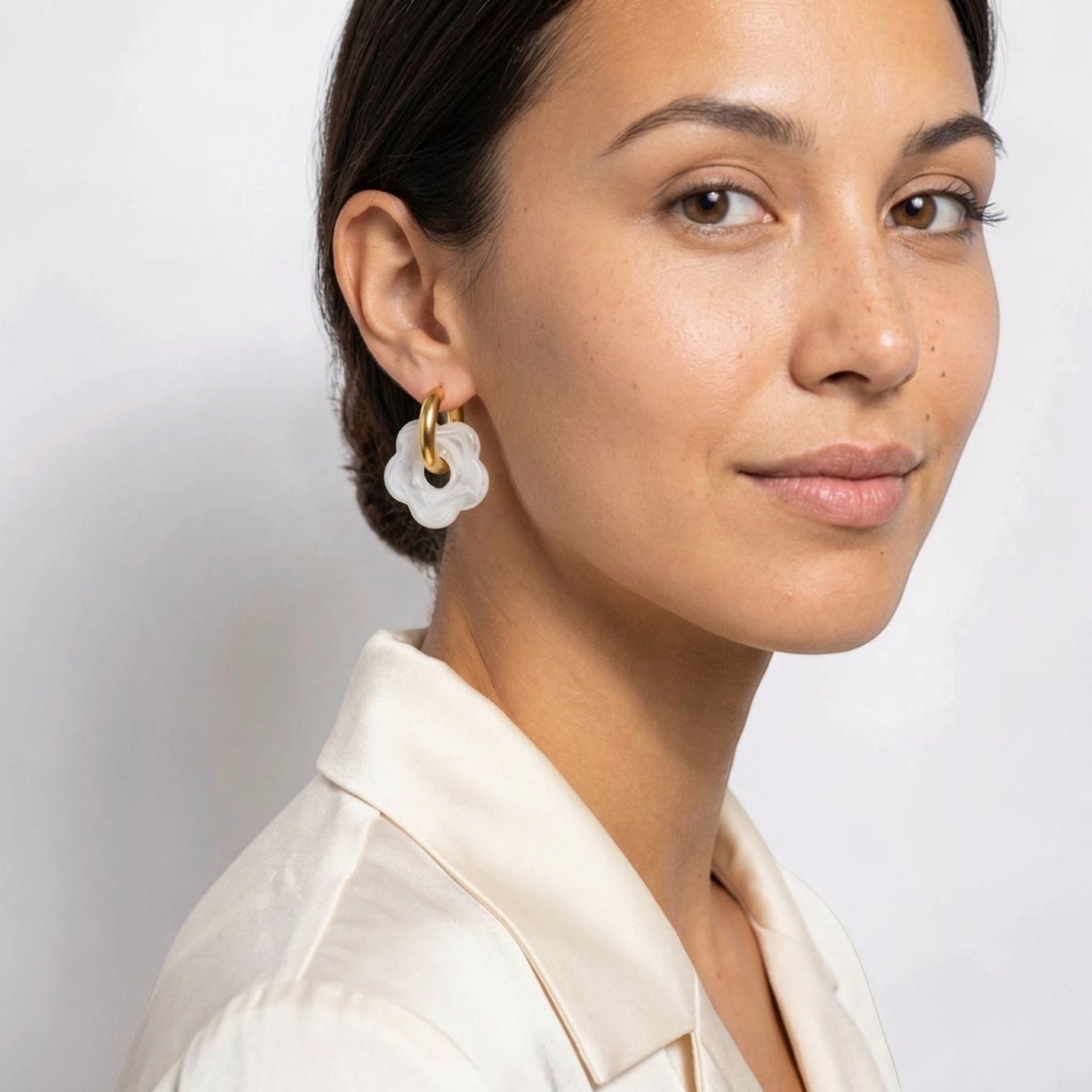 Chévereh White Bloom & Gold abstract flower drop earrings with gold hoops and milky white translucent charms.